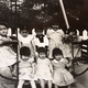 Katherine Kim, who was adopted by American parents in 1961 (far right), sits on the far upper right in an orphanage in South Korea.